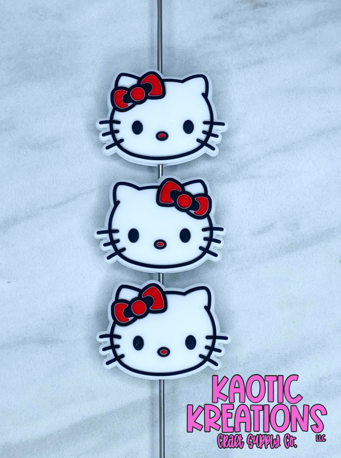 RED BOW KITTY FACE SILICONE FOCAL D67 (1ct)