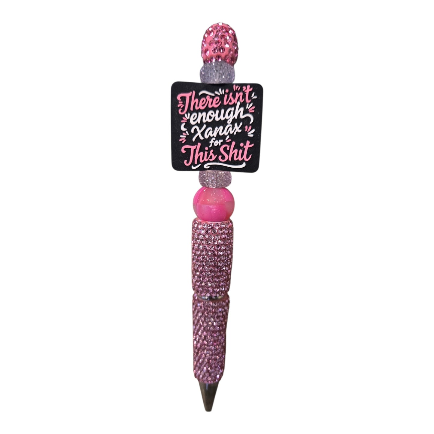 A pink rhinestone-covered pen with a black square charm that reads 'There isn't enough Xanax for This Shit' in pink and white lettering, shown on a plain white background.