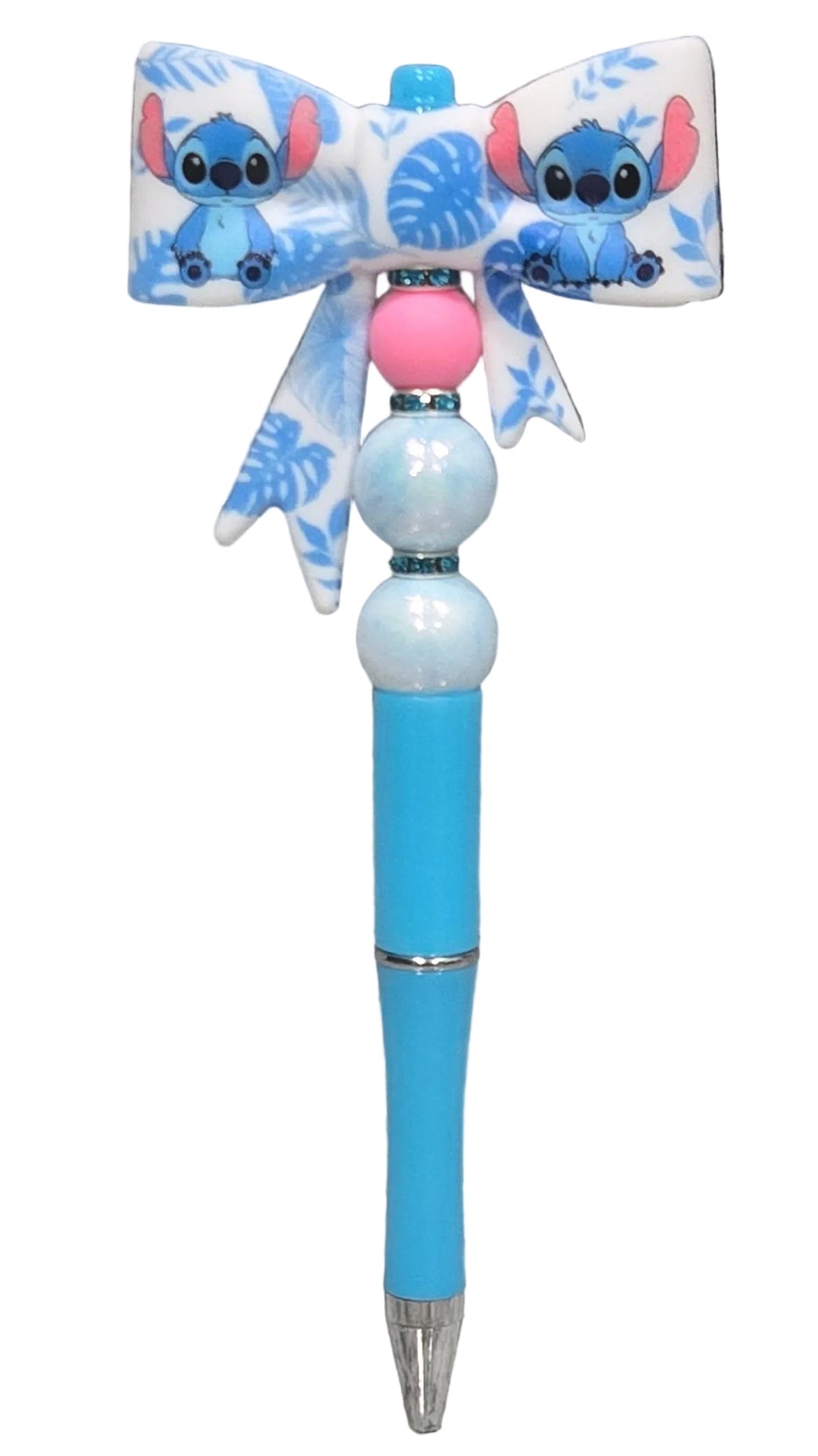 Blue Stitch-inspired beaded pen with tropical character bow, pink accent bead, shimmering blue beads and rhinestone spacers.