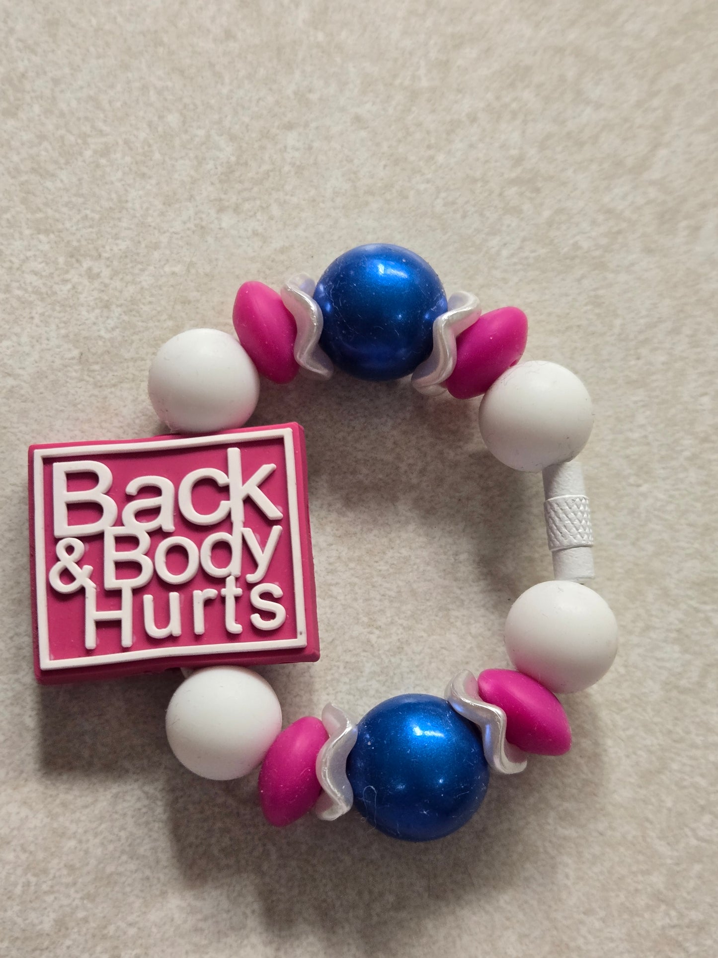 Back&BodyHurts Handle Charm