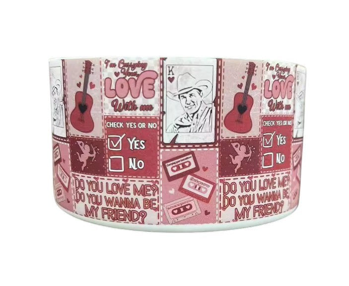 THE SALTY CHIC pink silicone tumbler boot with Carrying Your Love With Me guitar, cowboy, and cassette tape print.