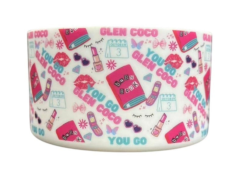 THE SALTY CHIC silicone tumbler boot featuring a white base with pink and blue Mean Girls themed print patterns.