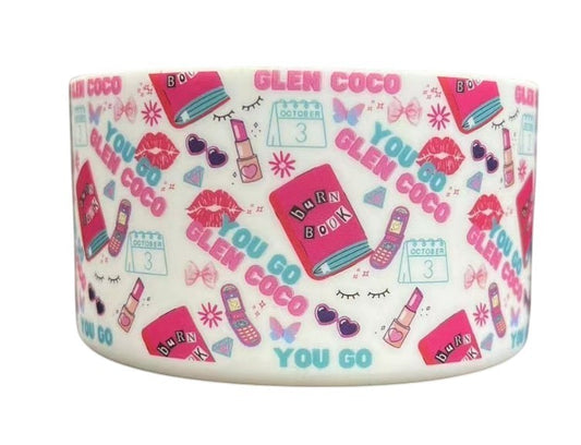 THE SALTY CHIC silicone tumbler boot featuring a white base with pink and blue Mean Girls themed print patterns.