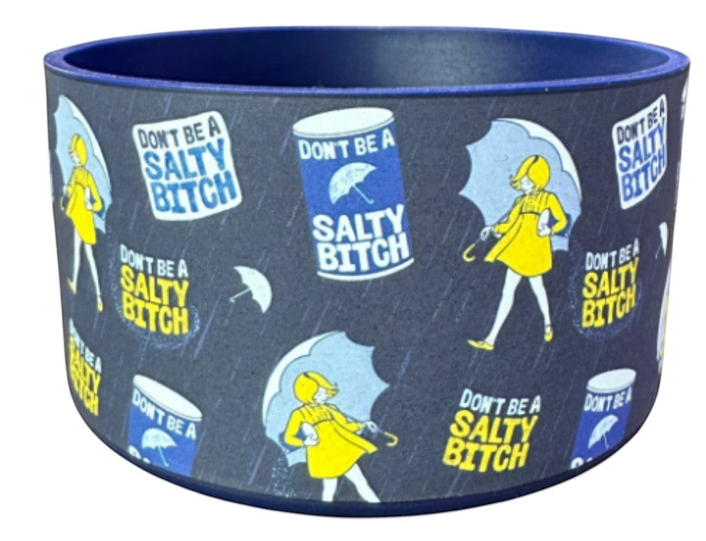 THE SALTY CHIC silicone tumbler boot featuring a playful yellow girl with umbrella print and salty quote pattern.